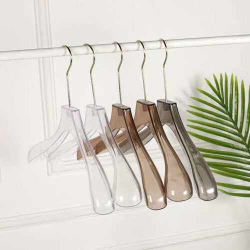 Apparel merchandising hangers with metal hooks