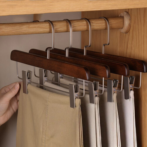 Black pant hangers with clips for garment display