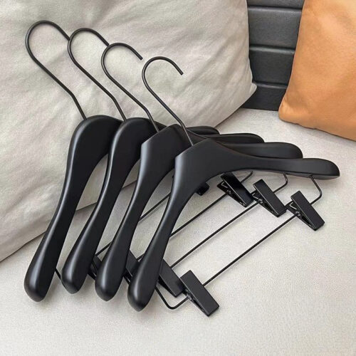 Black wooden hanger hook and shoulder detail