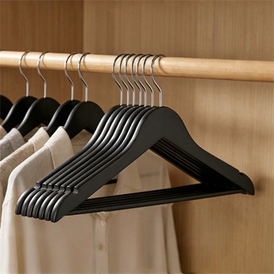 Black wooden suit hangers for retail display