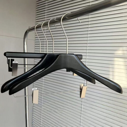 Matte black wooden hangers for brand display