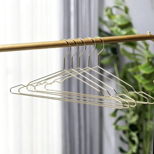 Metal hanger inspection before carton packing