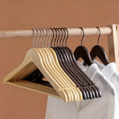 Natural wooden hanger with metal hook detail