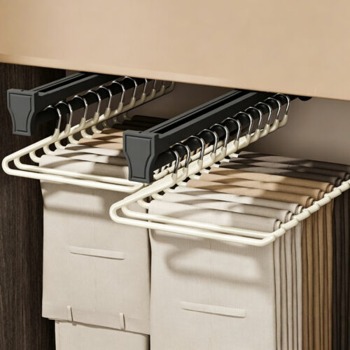 Plastic pant hanger detail with adjustable clips