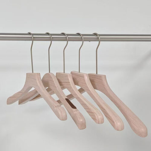 Retail apparel hangers arranged on clothing rack