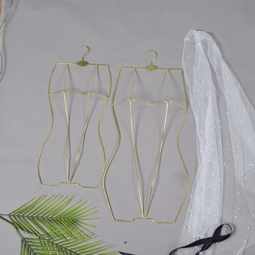 Retail swimwear hangers arranged on display rack