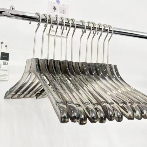 Wooden hangers for apparel brand presentation